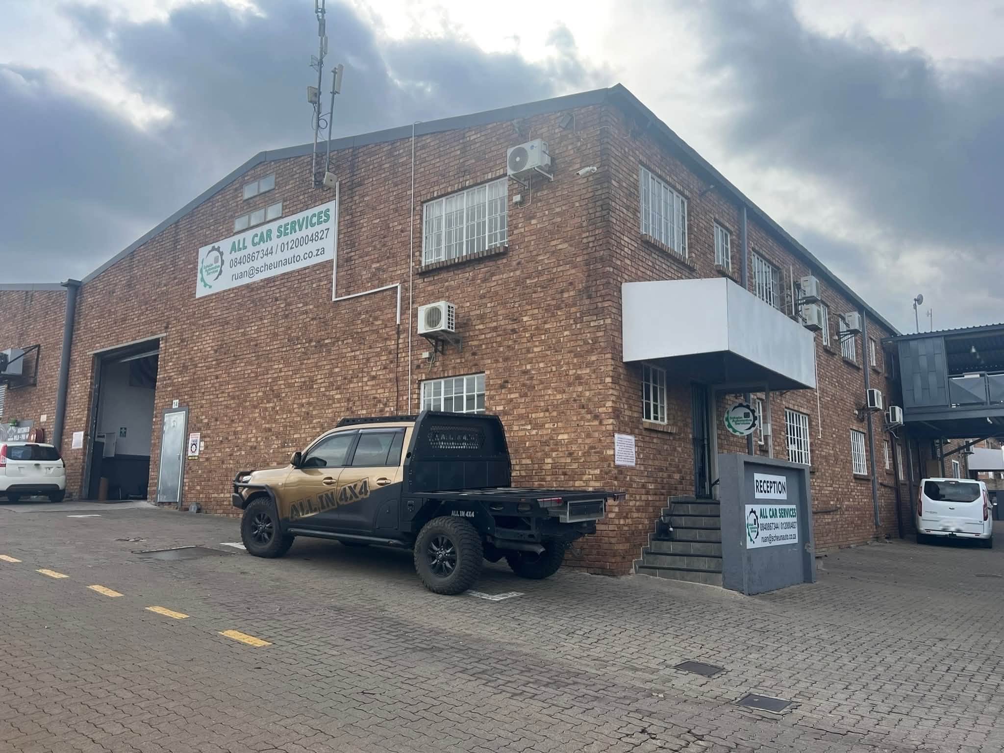 Scheün Automotive Services premises and reception entrance at Keymax Park